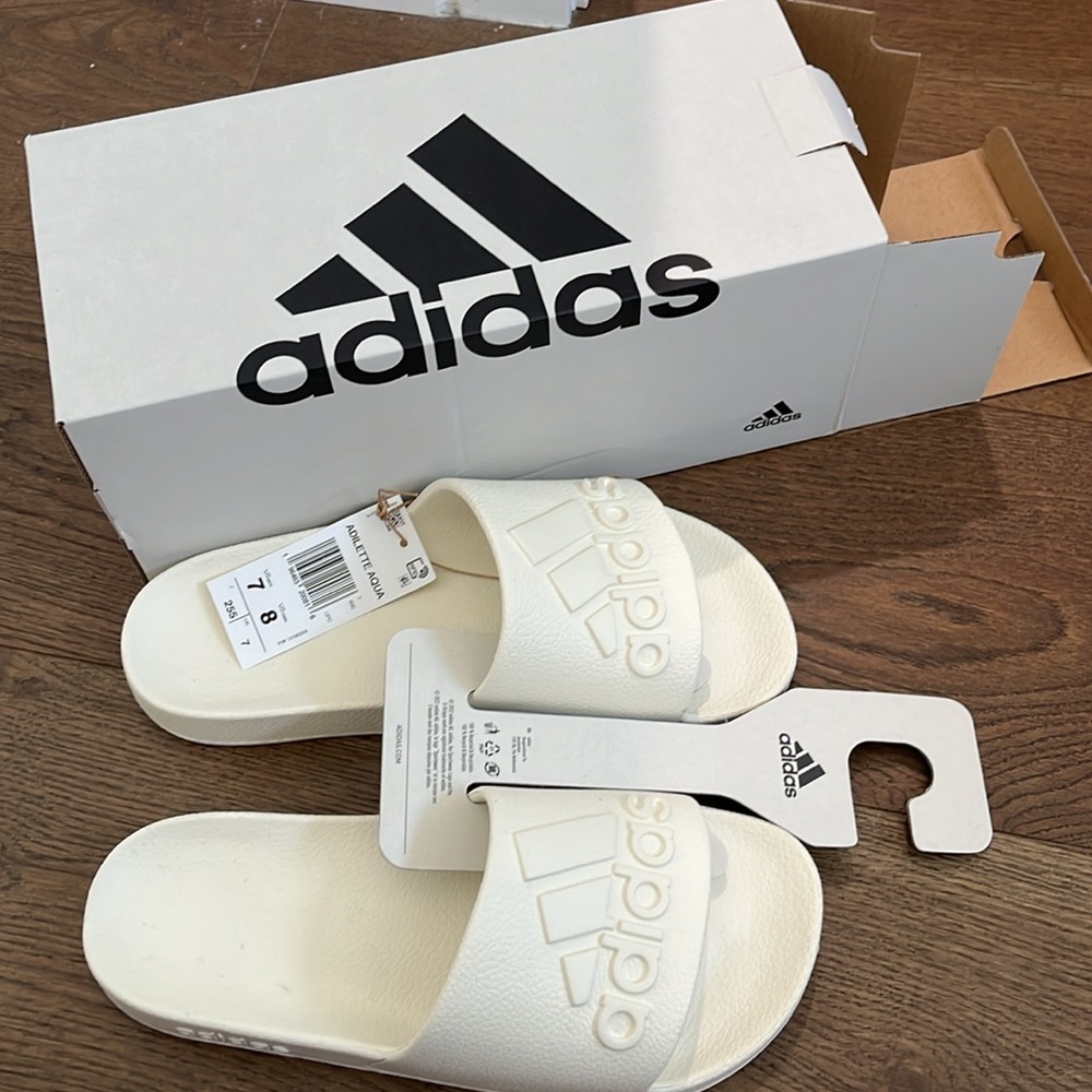 Adidas Adilette Aqua Slide Sandal (Women)
8 women’s/ 7 men’s NWT
